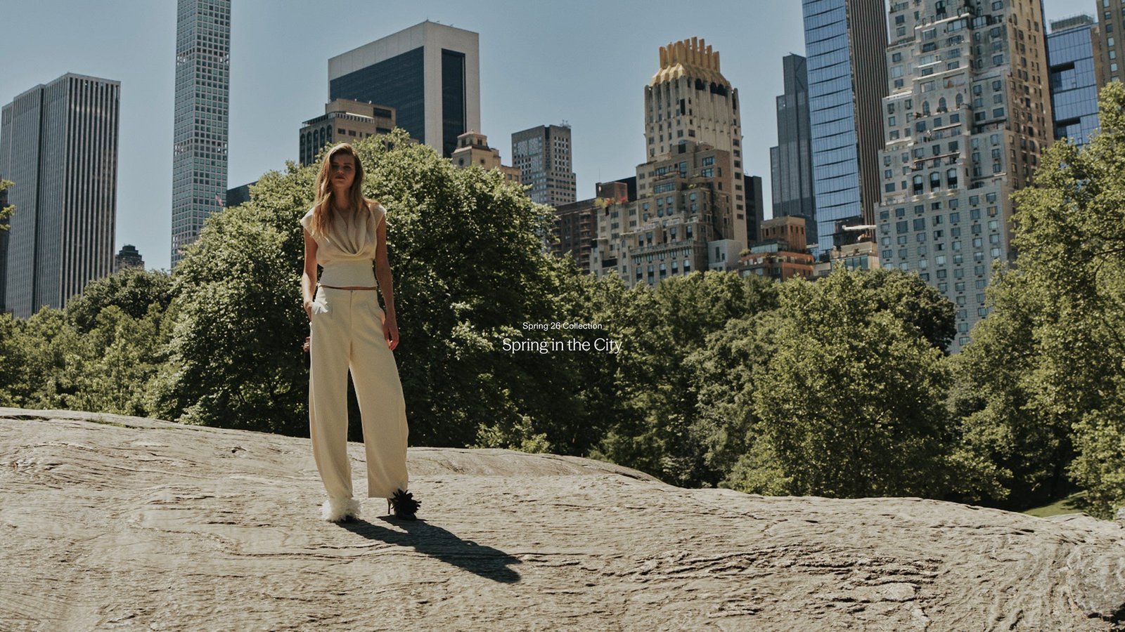 Woman wearing a neutral EdgyChic outfit in the city